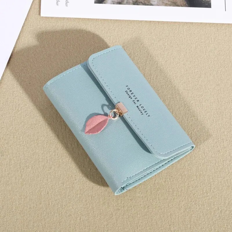 Sofía Valencia – Trifold Essence Edition | Cartera premium, compacta, elegante y funcional.